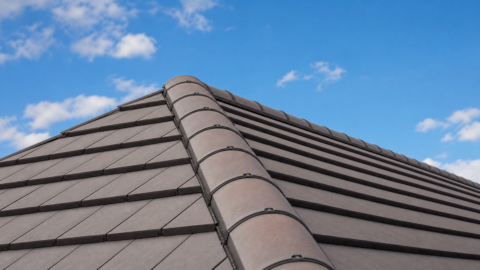 Completed dry ridge system on a UK pitched roof